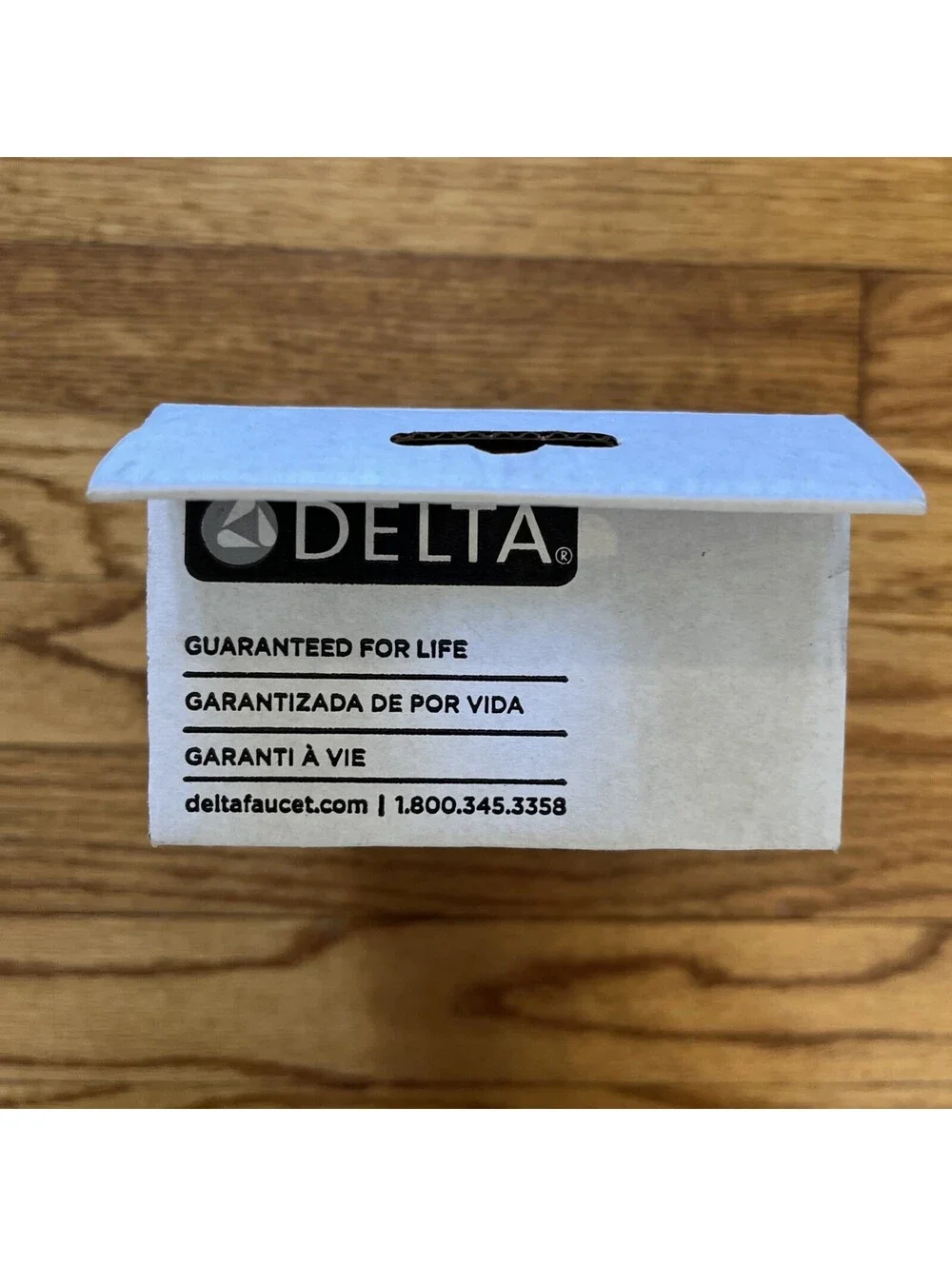 Delta 78955-CZ Tetra Wall Mounted Pivoting Toilet Paper Tissue Holder Bronze New